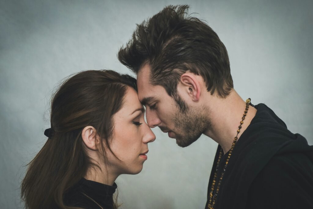 man and woman kissing each other man and woman kissing each other